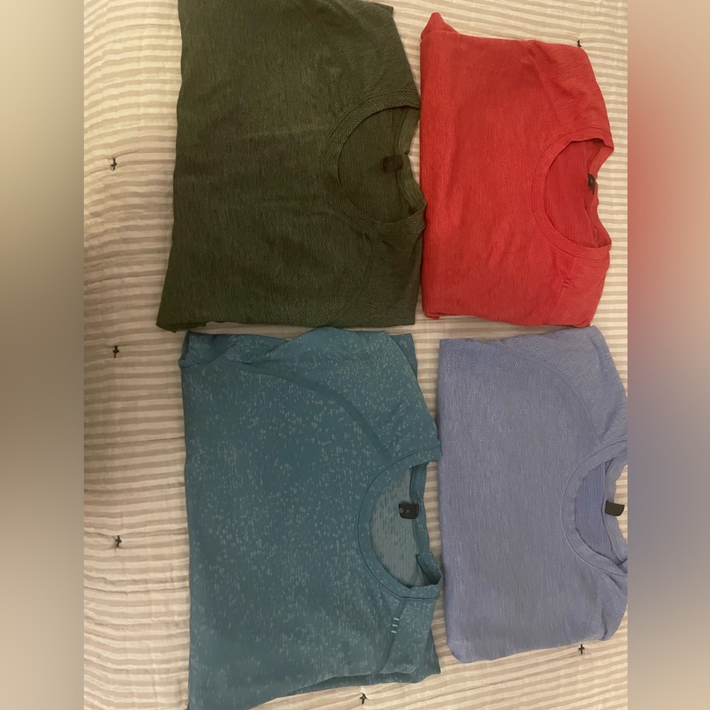 4 Lululemon Athletica tshirts all size medium.. gently worn